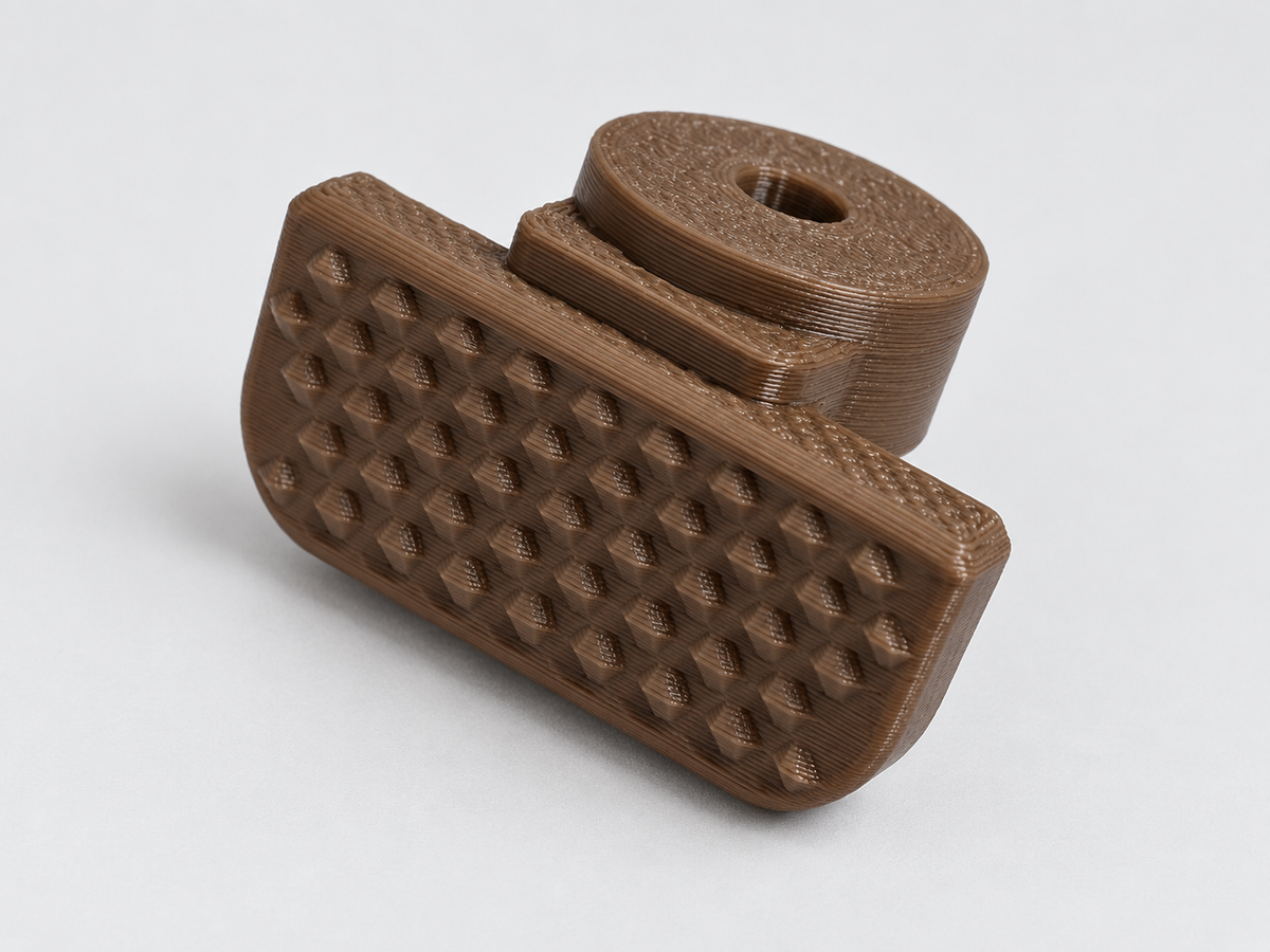 FDE thumb rest angled textured pad view